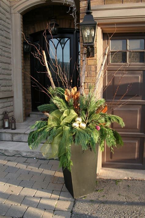 winter outdoor arrangments | Christmas planters, Easy outdoor christmas ...