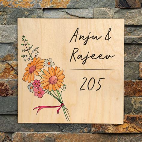 Daisy Bunch - Wooden Name Plate | Water-resistant | 9x9 inches – Housenama