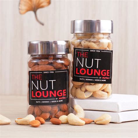 Send Two Shiny Golden Rakhis with Almonds N Cashews Online ...