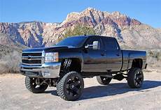 White Lifted Chevy Truck Wallpaper by 47 Lifted Chevy Truck Wallpaper On Wallpapersafari White Lifted Chevy Truck Wallpaper