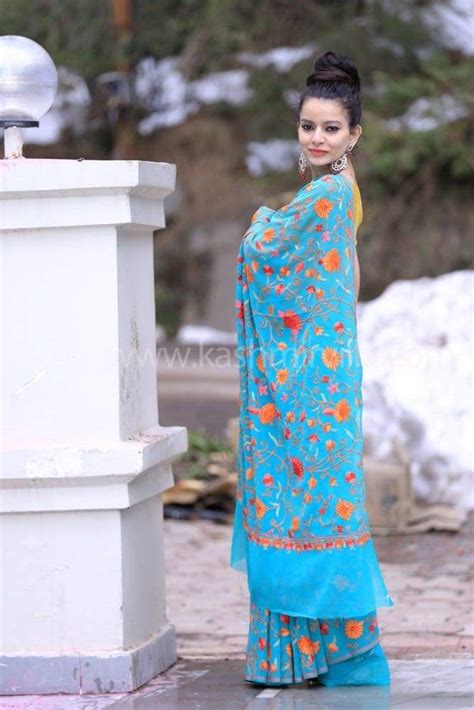 Sea blue color kashmiri aari work embroidered saree enriched