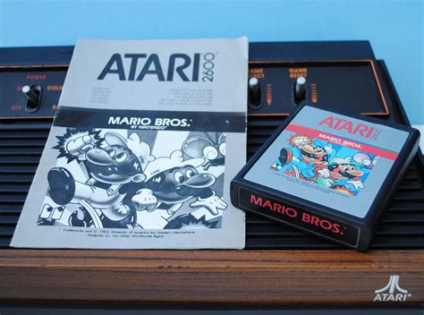 Mario Bros. Atari 2600 Game Cartridge and Manual
