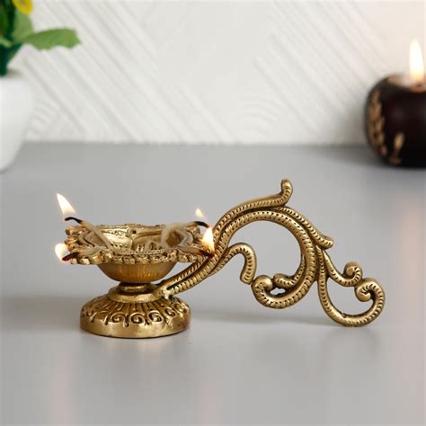Ethnic Carved Brass Diya with 4 Wicks for Pooja Room and Temple ...