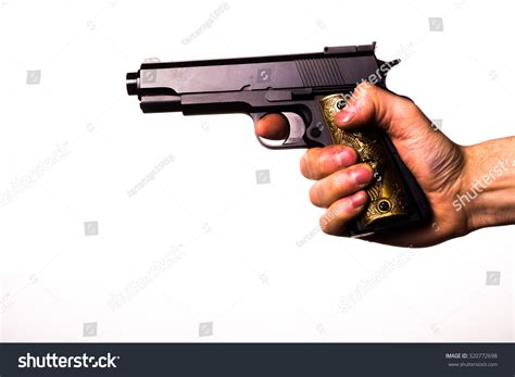 Right Hand Holding Gun Tactical Military Drop Leg Holster Thigh Pistol