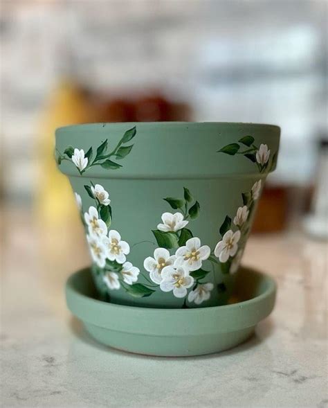 RN Creative Hand-Painted Terracotta Planter Pot with White Floral ...