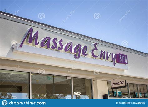 Massage Envy sign editorial photography. Image of building - 163150192