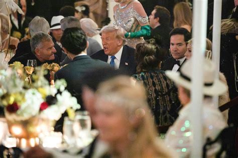 Trump’s Great Gatsby moment: partying as Americans go hungry