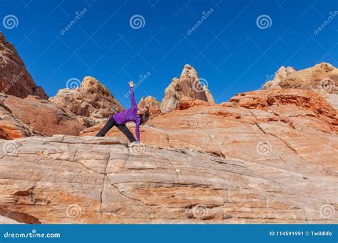 Practicing Yoga in Red Rocks Stock Image - Image of nature, desert ...