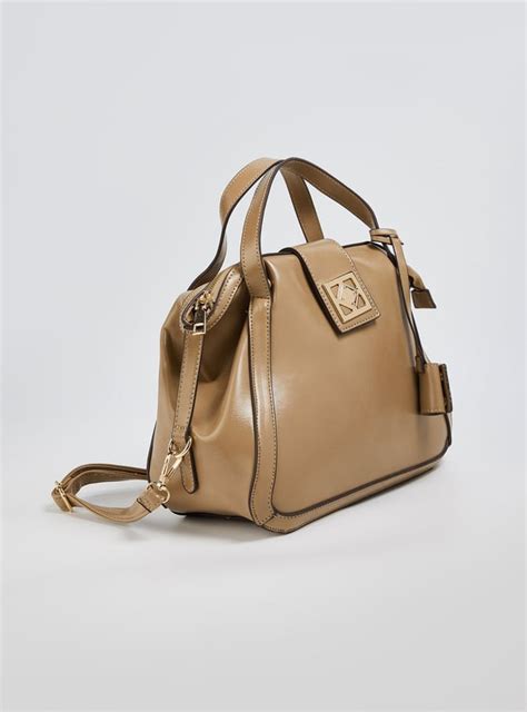 Buy Women Solid Sling Bag Online at just Rs. 1299.0 - 1000015612796 ...