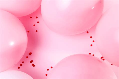Top view pink balloons on table | Premium Photo