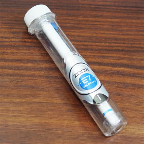 Zoox E7 White Color Body With Silver Clip Medium Tip Blue Writing Cap ...