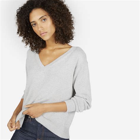 An easy V. This cotton v-neck sweater has a relaxed fit and cropped ...