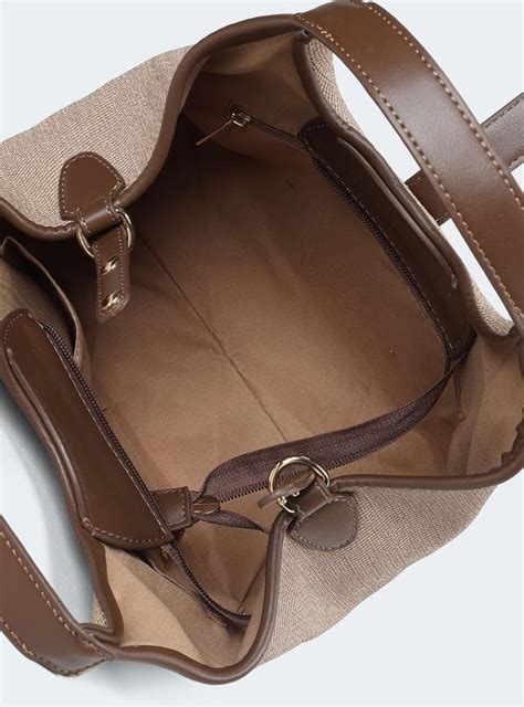 Buy Women Textured Shoulder Bag Online at just Rs. 999.0 ...