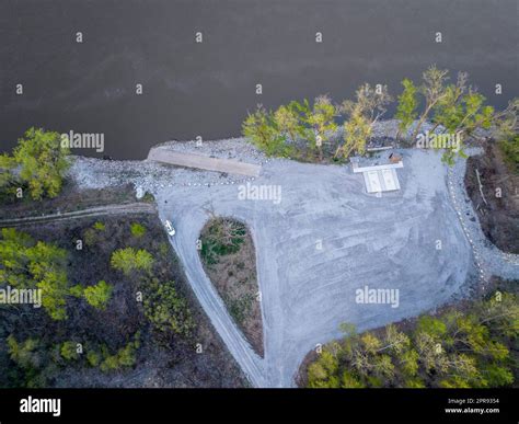 river access with a boat ramp - sunrise aerial view of Missouri River ...