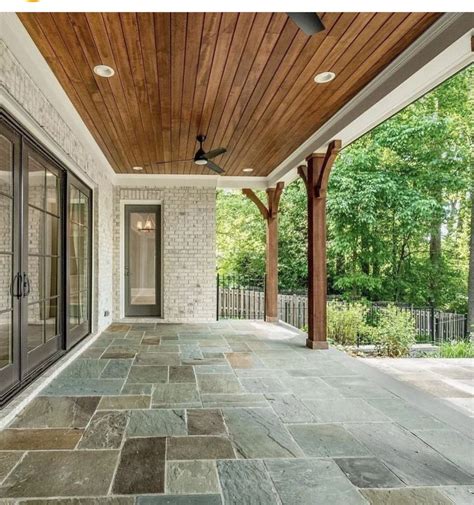 Rustic Farmhouse Porch with Stone Flooring