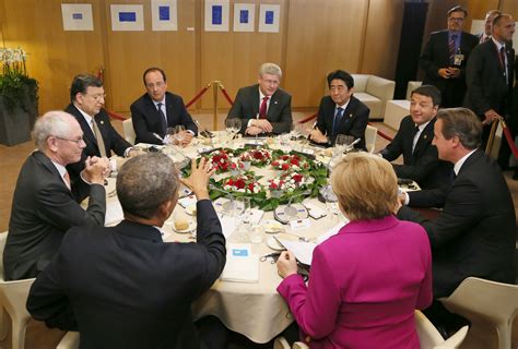 The G7 group photo shows the tensions overshadowing the summit ...