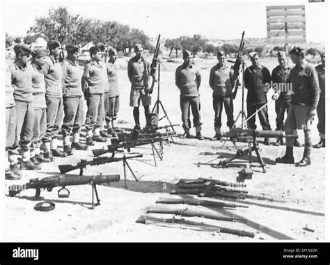 Cypriot troops receive instruction on different types of small arms ...