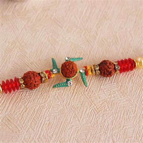 Send Rudraksha Swastika Rakhi Online