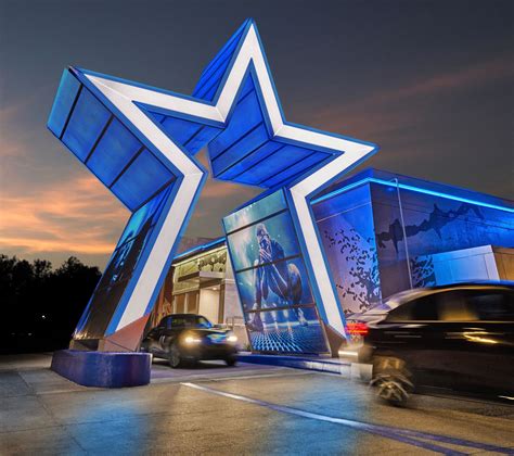 Post Malone Opens Dallas Cowboys Themed Raising Canes