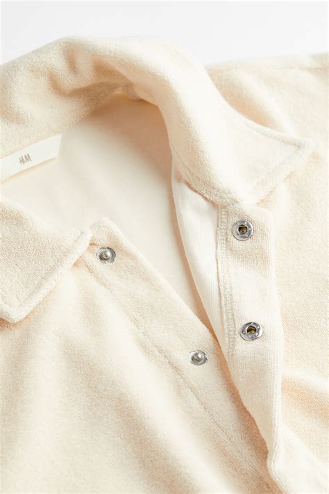 Terry playsuit - Cream - Ladies | H&M IN