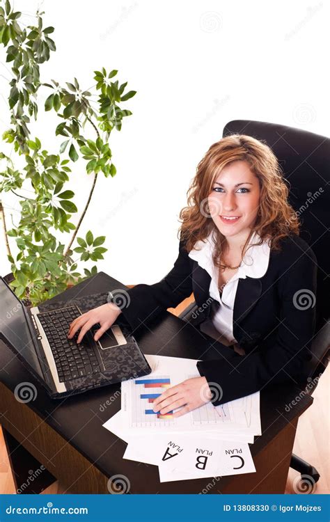Businesswoman Sitting in Office Stock 的图像结果