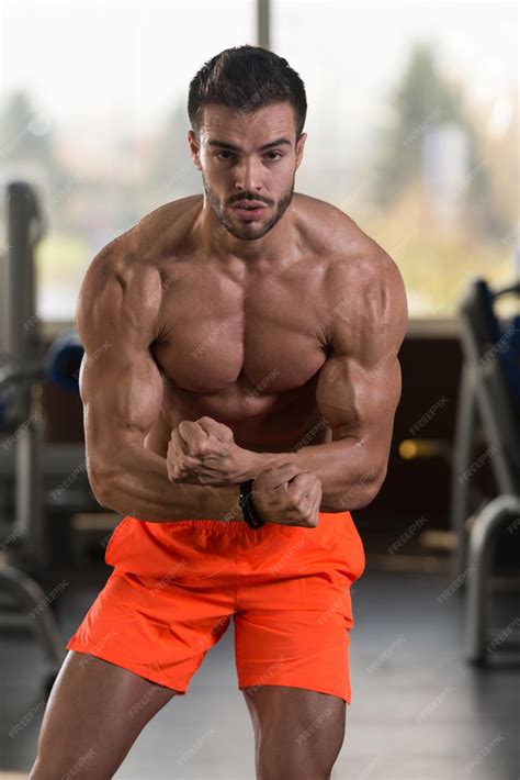 Premium Photo | Bodybuilder performing most muscular pose