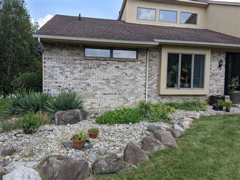 Homeowner turns traditional lawn into gorgeous rock garden and shares ...