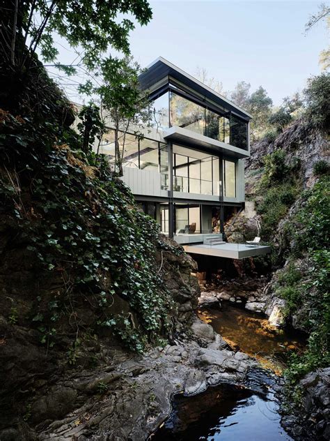 Suspension House Bridges a Creek Between California Hills