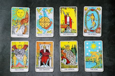 A pile deck of tarot cards gypsy inspired on a wooden background ...