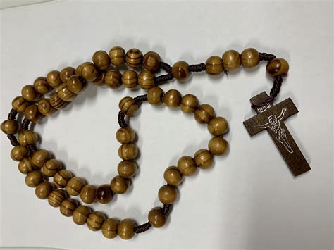 Rosary with brown wooden beads - Our Sorrowful Mother's Ministry
