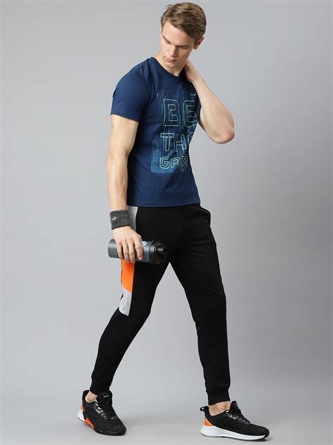 Alcis Men Black Solid Slim Fit Mid-Rise Joggers MJOMA210021-S