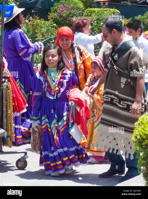 Adults and children in traditional Mexican clothing Stock Photo - Alamy