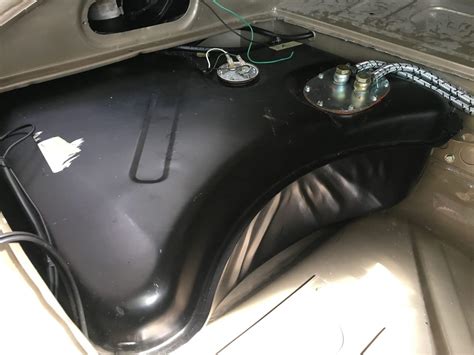 Installing the E-Type fuel tank - Bridge Classic Cars