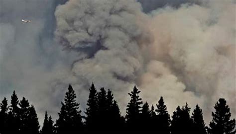 Airlift for thousands trapped by Canada wildfires | World News | Zee News