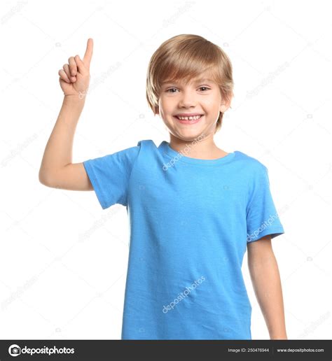 Little boy in t-shirt and with raised index finger on white background — Stock Photo © serezniy ...