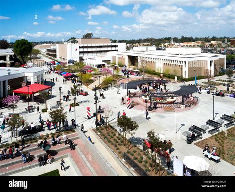 Students fill the campus of a Santa Ana, CA, community college at ...