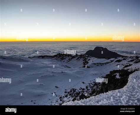hikers on the ridge ascend mount kilimanjaro the tallest peak in africa ...