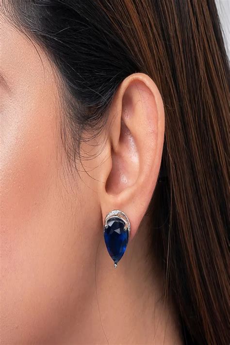 Rhodium-Plated American Diamond Leaf Shaped Studs Earrings- Blue ...