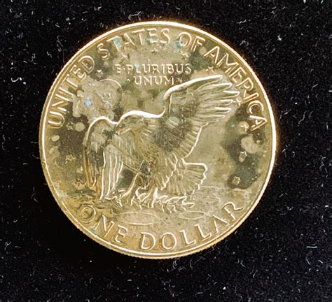 1974 EISENHOWER UNCIRCULATED GOLD LAYERED DOLLAR COIN | Property Room