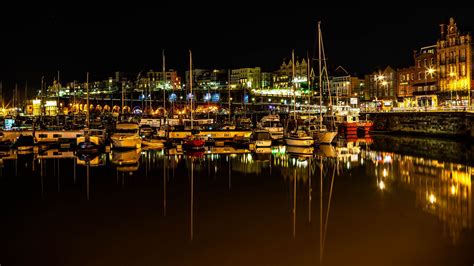 Download wallpaper 2048x1152 harbor, yachts, sea, buildings, lights ...