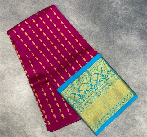 Magenta shade Pure Kanchipuram Kids Pattu Pavadai with contrast border ...