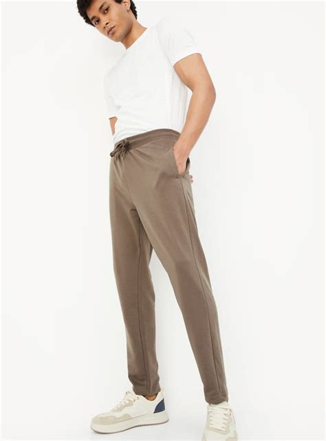 Buy Men Solid Athleisure Track Pants Online at just Rs. 699.0 ...