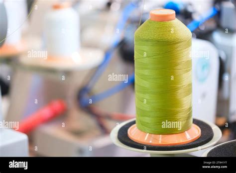 Image result for How to Use Large Thread Spool On Machine