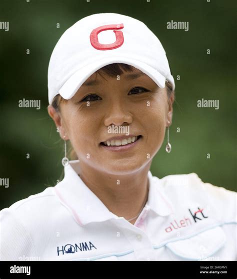 Mi Hyun Kim from South Korea smiles after finishing her round on day ...