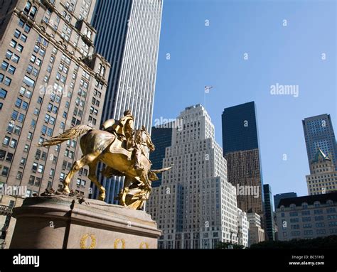 equestrian gold colored statue at Central Park New York Stock Photo - Alamy