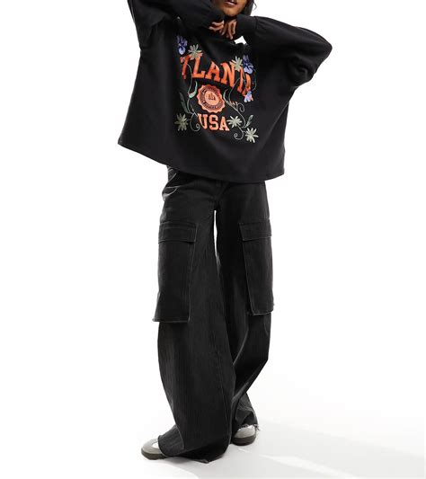 ASOS DESIGN oversized hoodie with embroidered atlanta graphic in black ...