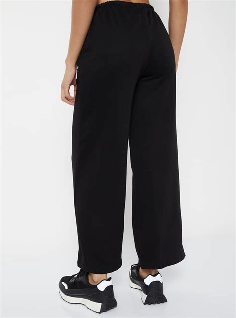 Buy Women Textured Wide Leg Sports Track Pants Online at just Rs. 799.0 ...