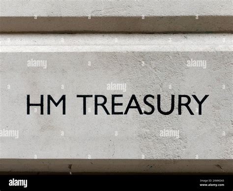 Close-up view of the HM Treasury name-plate at the main entrance to the ...