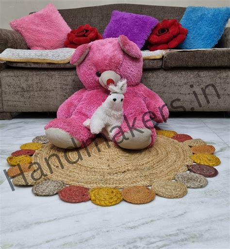 Handmakers Jute and cotton are rug with multiclored outer circle for ...