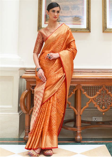 Carrot Orange Zari Woven Patola Silk Saree - Clothsvilla